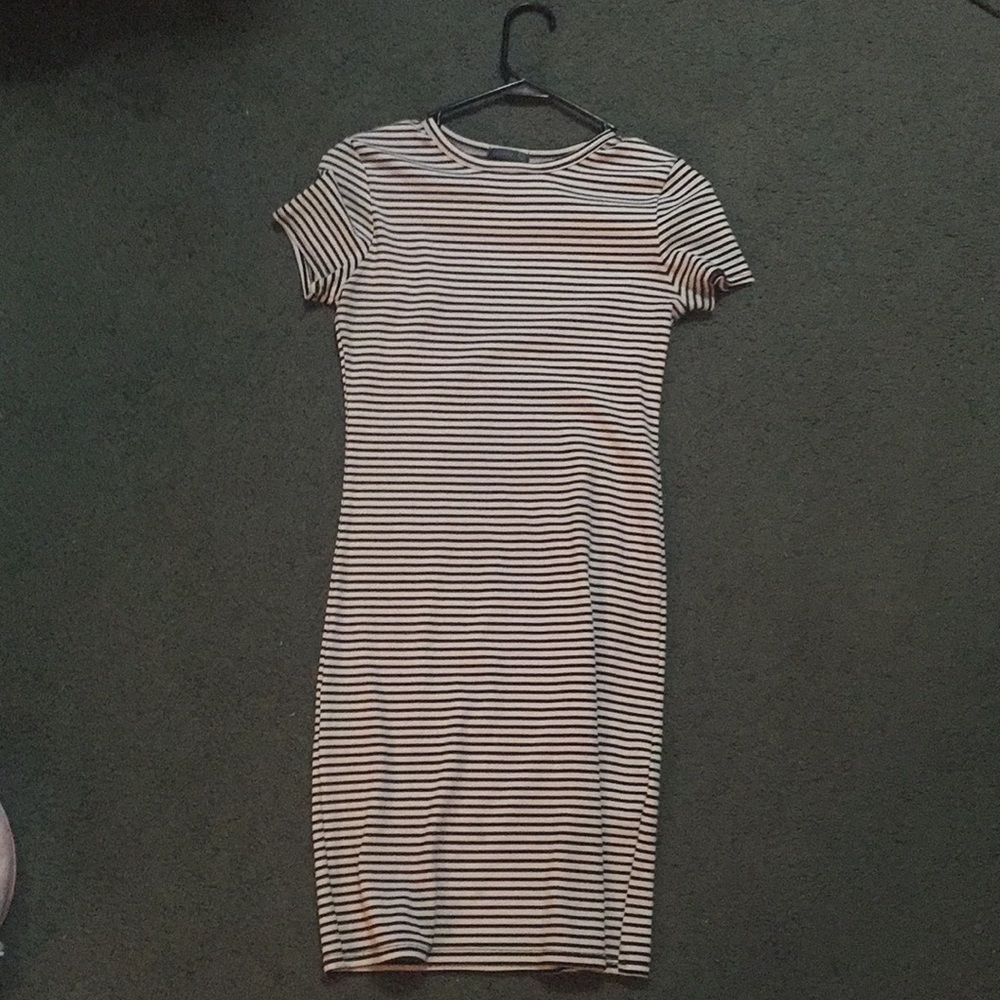 Thigh length black and white dress